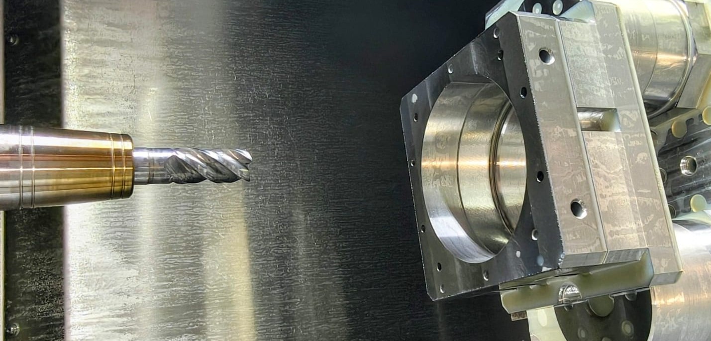 Machined aluminium component on fixture